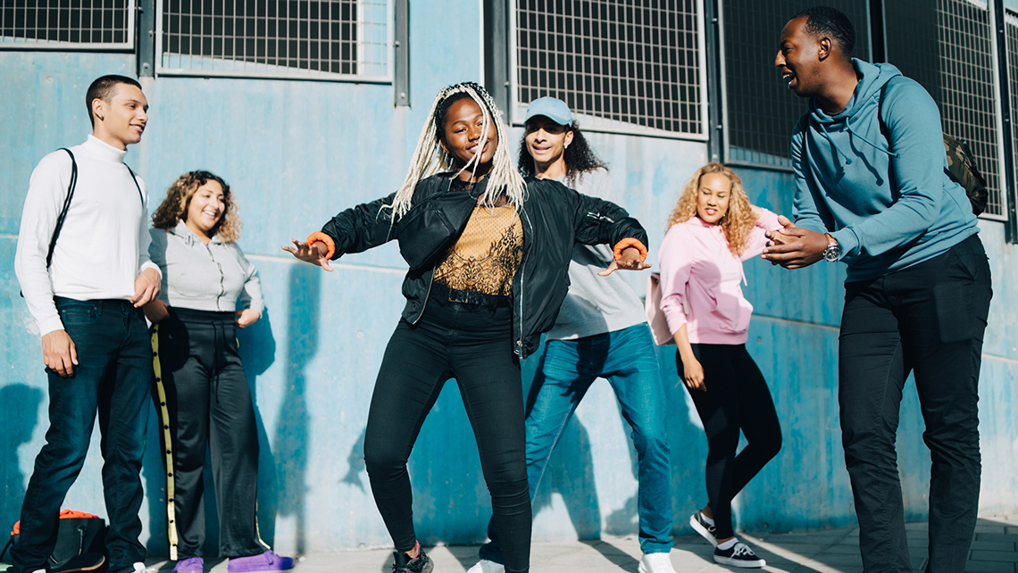 Group of people dancing and practicing their hip hop dance.