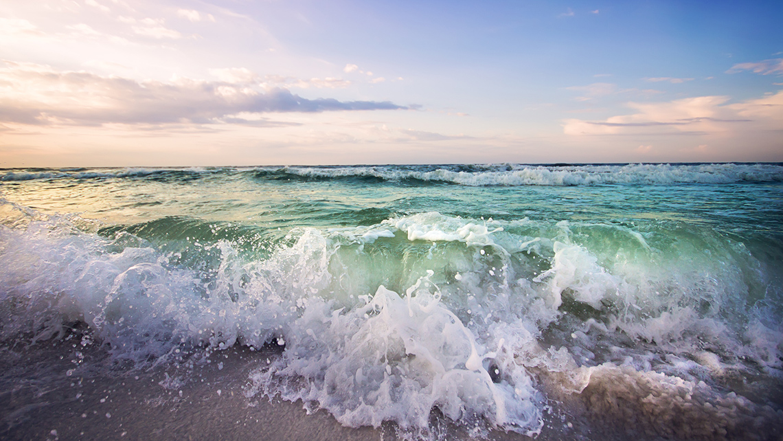 Waves crashing on a beach.