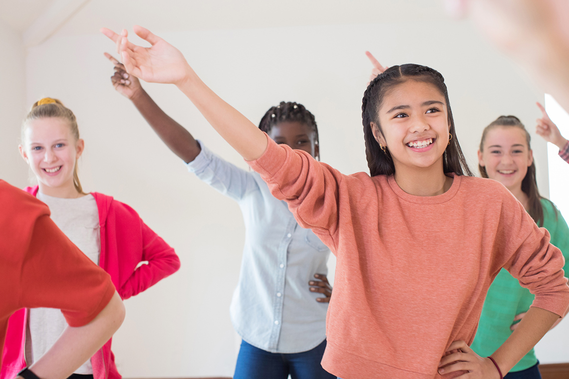 Three Teens Dancing
