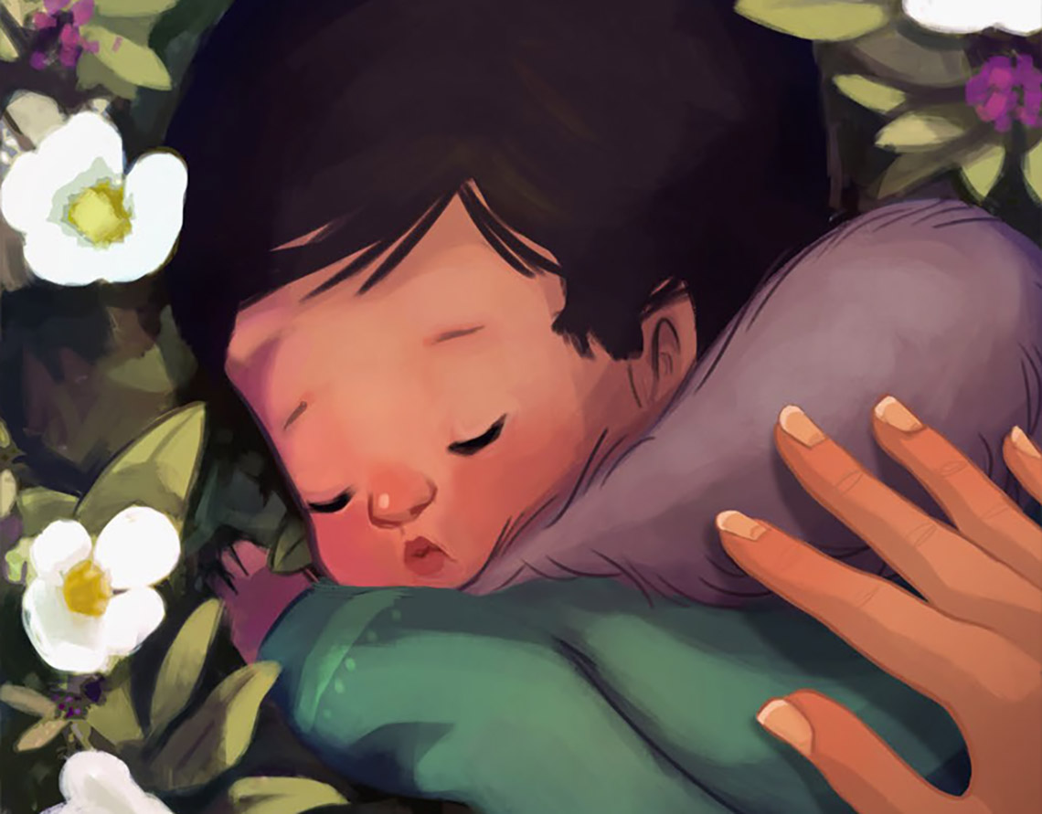 A baby sleeps on the flowers while an adult's hand is on their back.