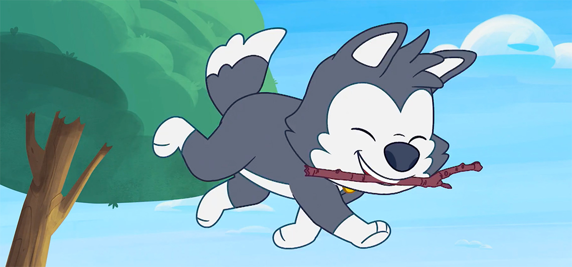A dog named Smudge fetching a stick