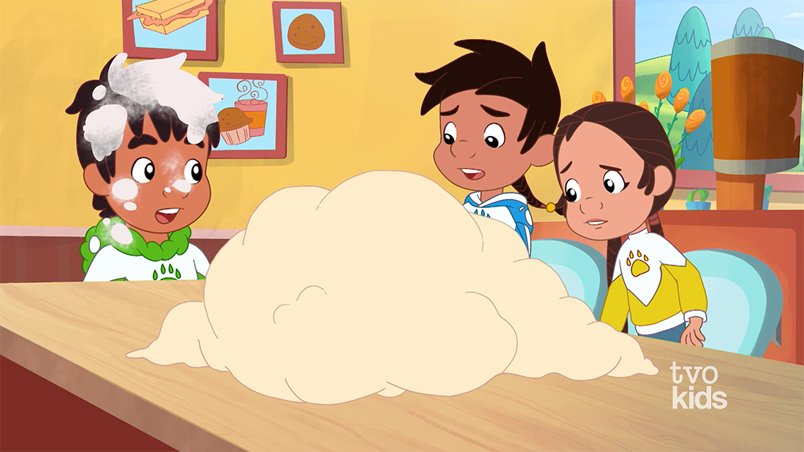 Joe, Nina, and Buddy looking at the big bannock dough mess.