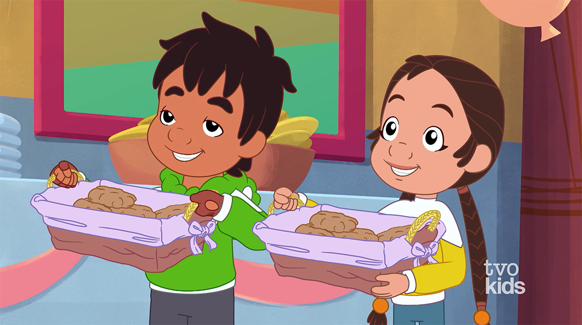 Buddy and Nina holding baskets of delicious bannock.