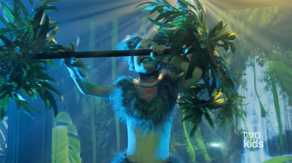 Ella is dressed as a koala bear and pretends to be eating at the beginning of her performance.
