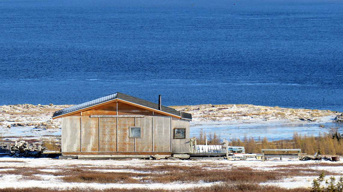 A cabin by the water in the Nunavik territory.