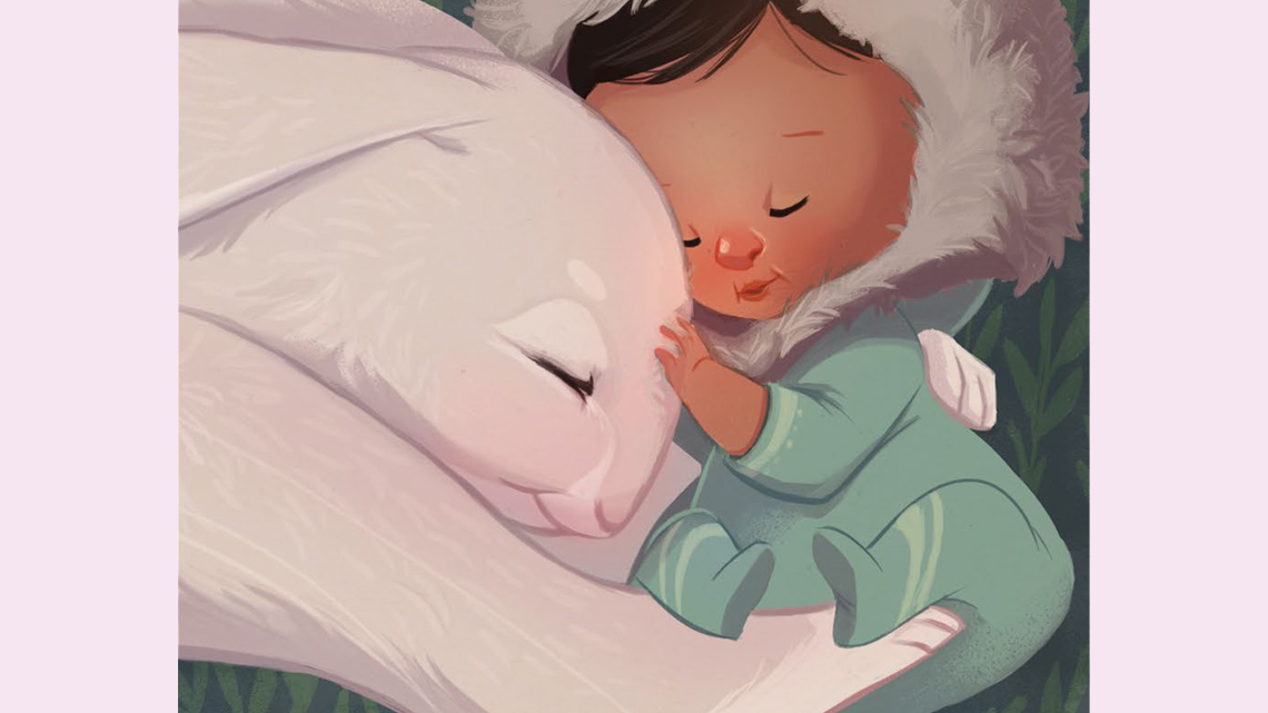 An Arctic hare cuddling a baby.
