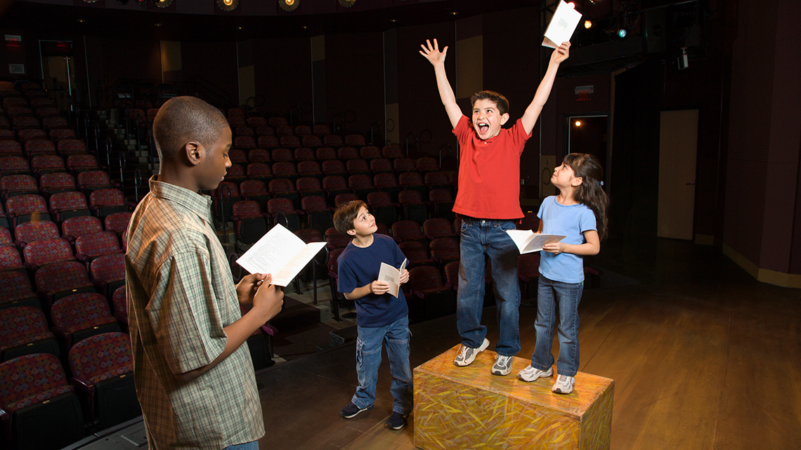 Students practicing a play.