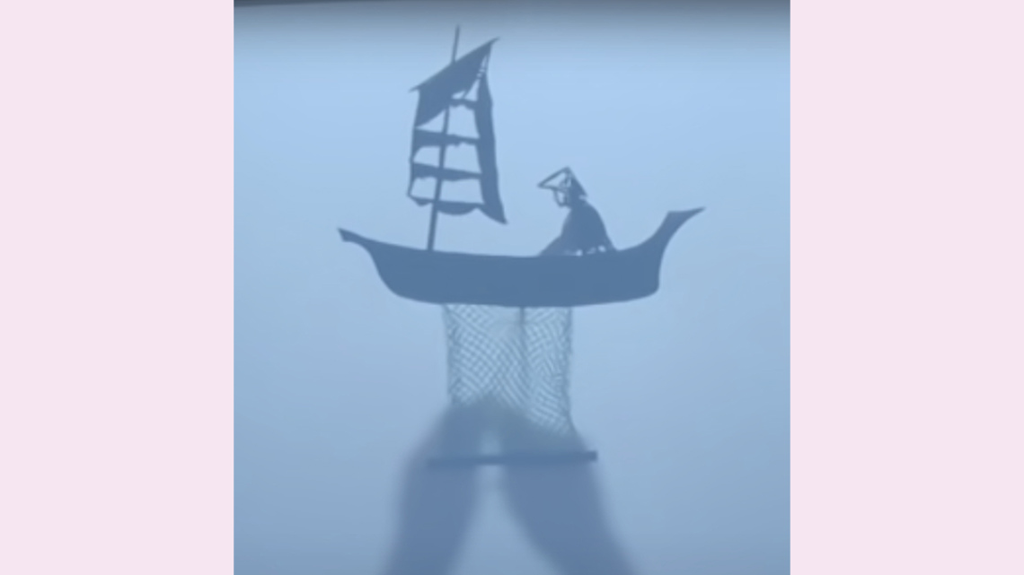 A shadow puppet of a boat on a white background. 