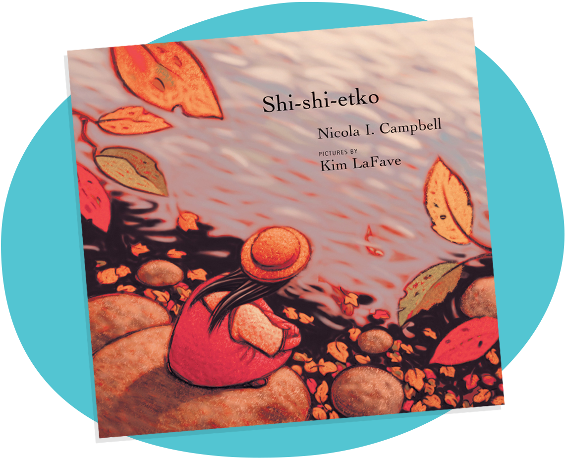 The book cover of Shi-shi-etko by Nicola I. Campbell shows a young girl sitting on a large rock beside smaller rocks, leaves, and a pond.