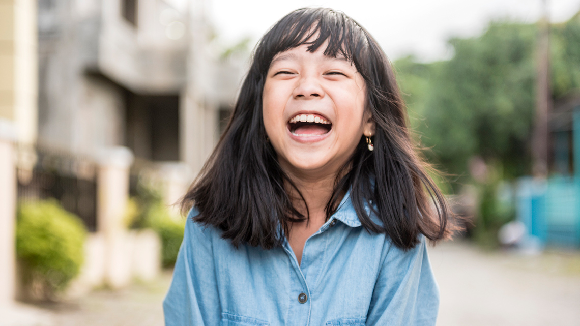 A child laughing.