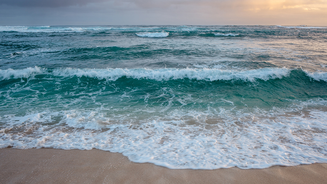 Ocean waves on a beach.