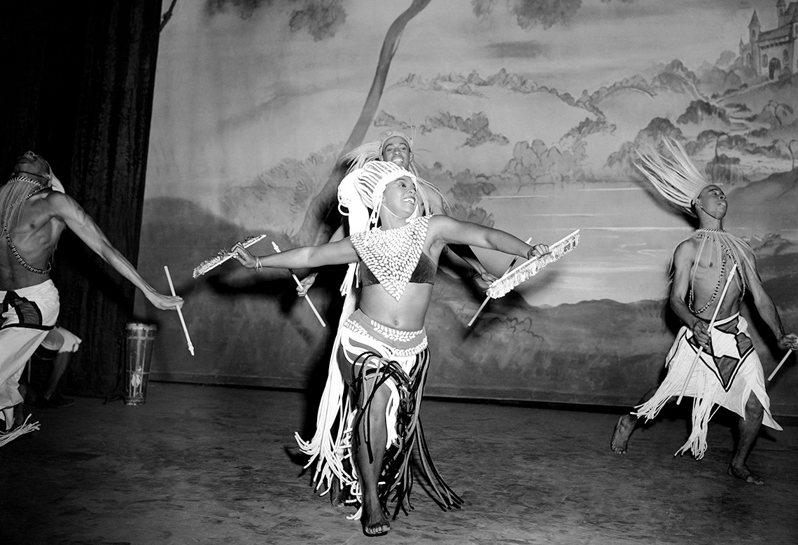 Photograph of dancer Pearl Primus performing on stage.