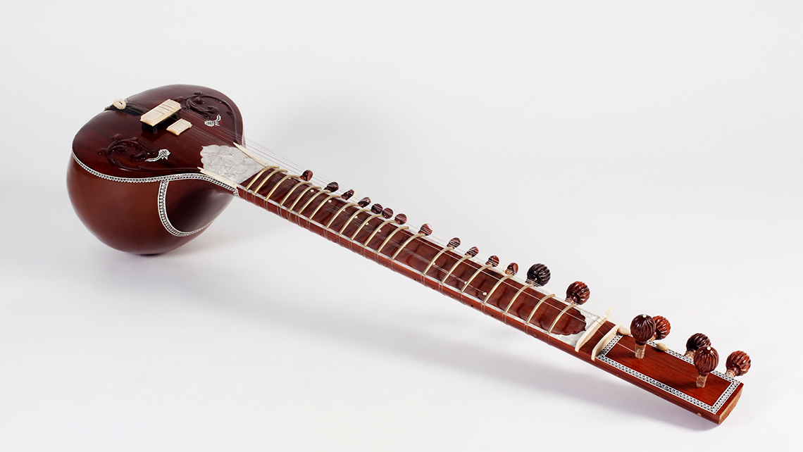 A sitar: a stringed instrument with a long neck.