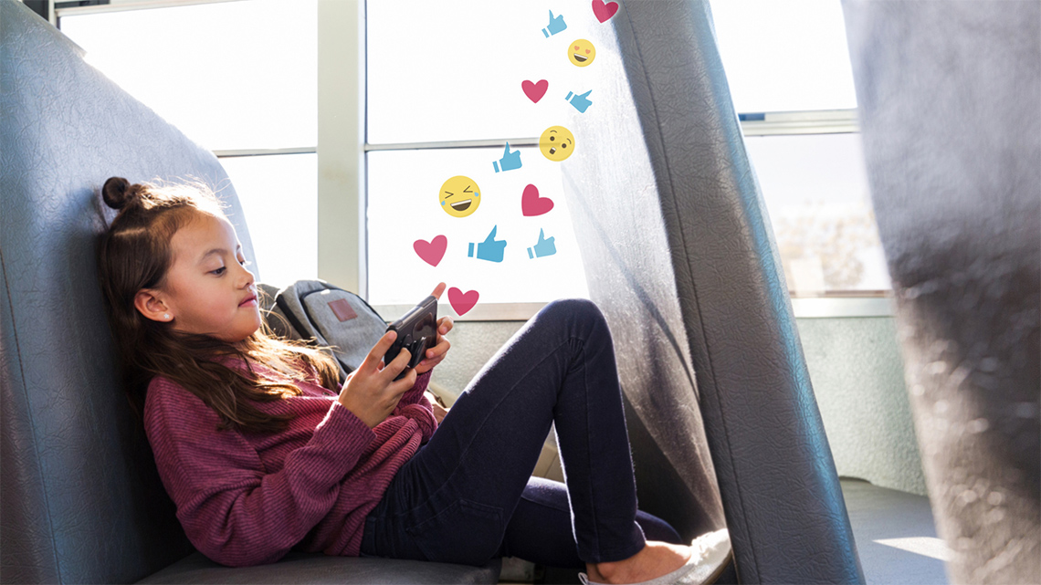 Emoticon symbols that include hearts, thumbs up, a laughing face, a surprised face and a sad face.