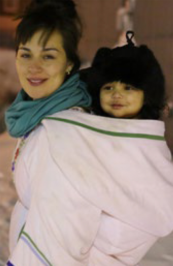 Picture of author Celina Kalluk and her child.