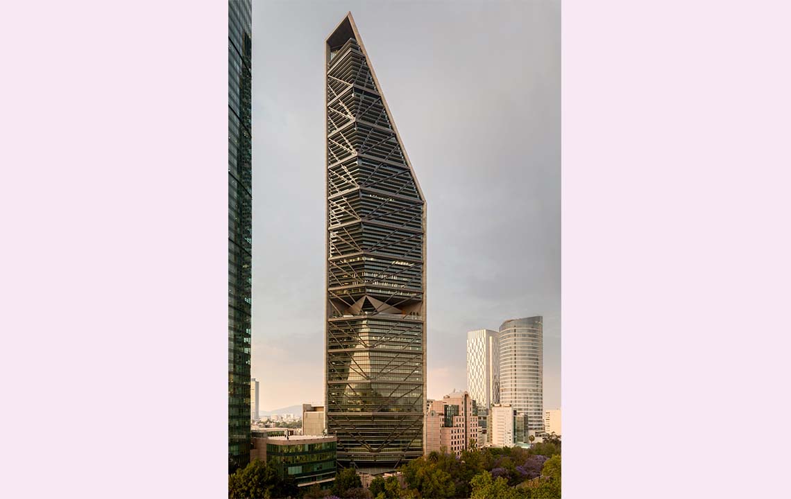A modern skyscraper with various window open and closed.