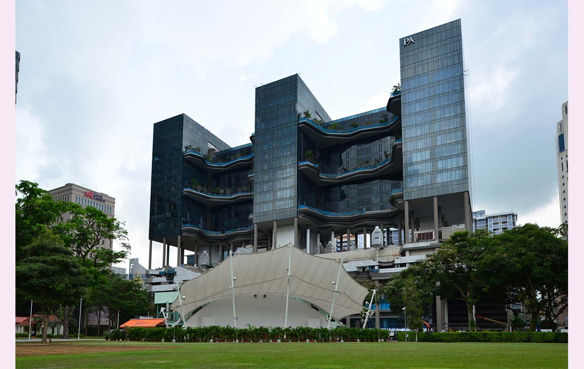 A hotel with with garden balconies connecting the main hotel towers together.