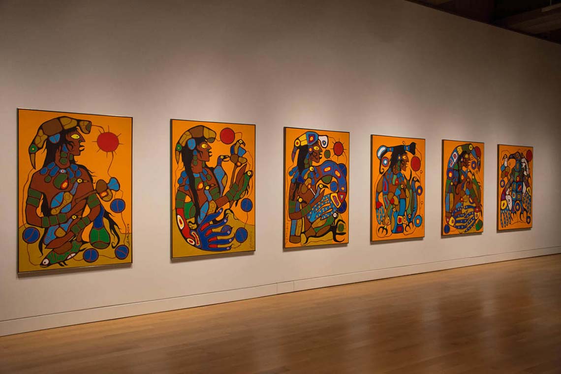 All six panels of the painting Man Changing into Thunderbird installed in an art gallery.
