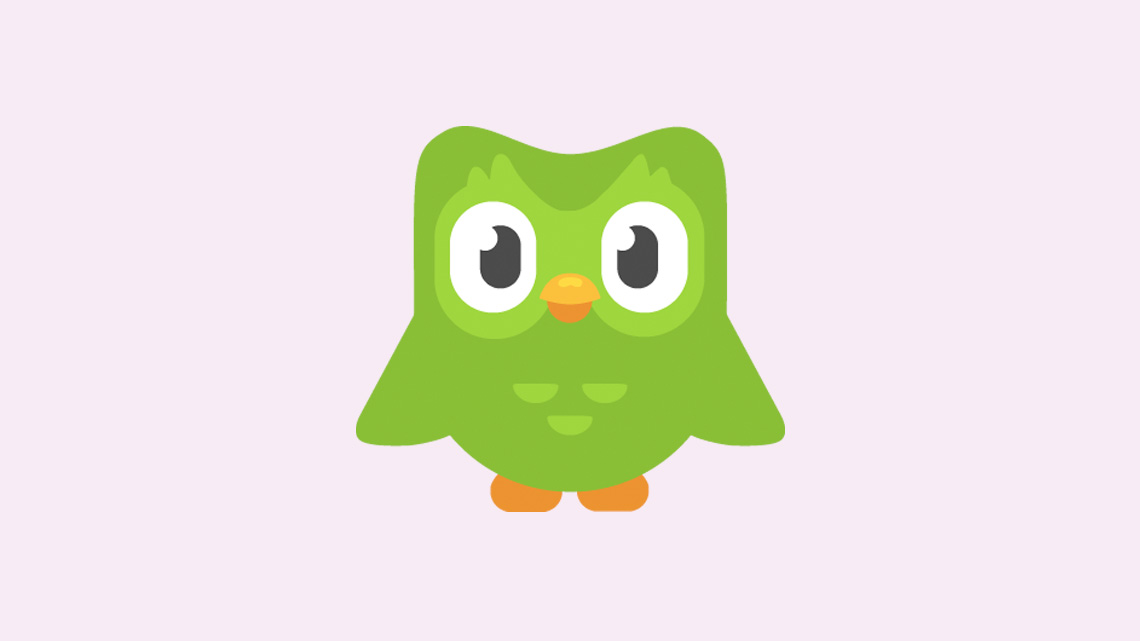 A green cartoon owl.