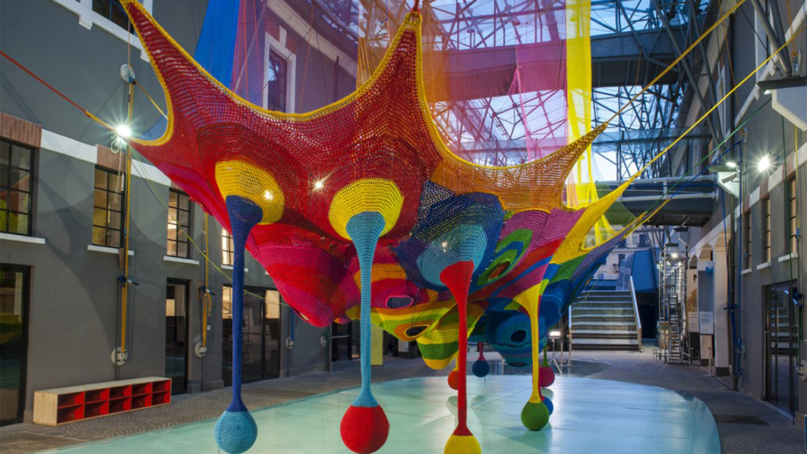 A playground knit out of textiles. Children can jump, roll, and crawl in the net.