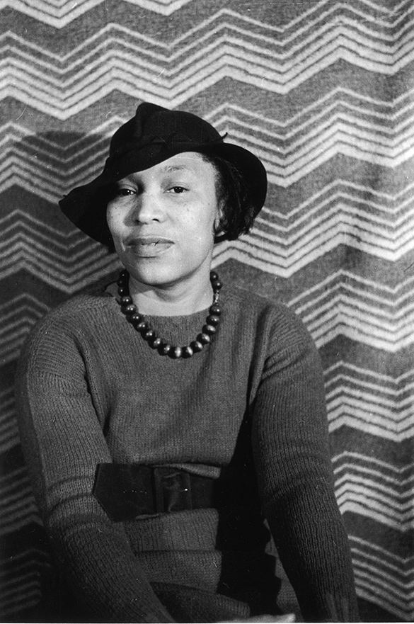 A historical black and white photograph of the writer and anthropologist Zora Neale Hurston.
