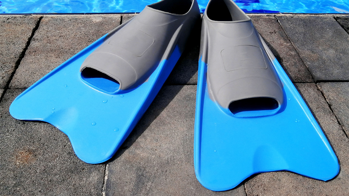 Swim flippers to wear on feet while swimming.