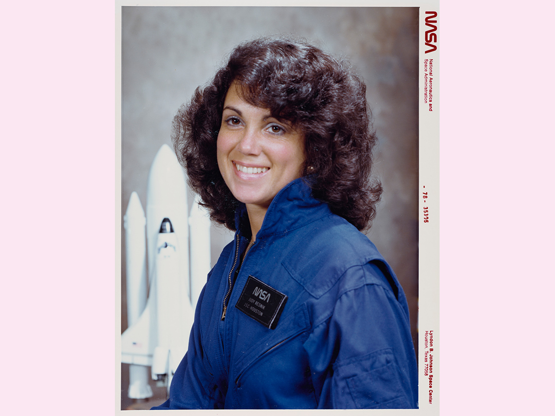 A white female NASA astronaut.