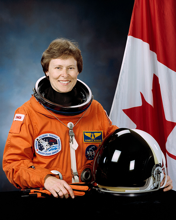 A female astronaut in a flight suit