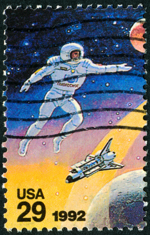 A 1992 American postage stamp featuring an illustration of an astronaut in space.