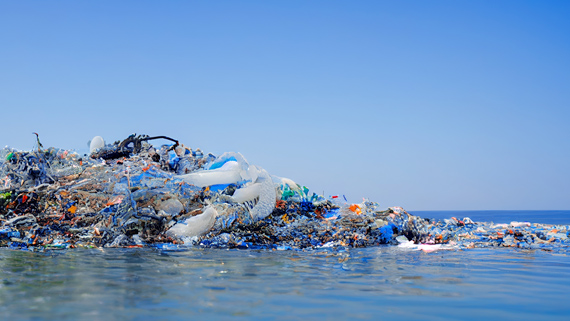 A large pile of plastic garbage floating in open water