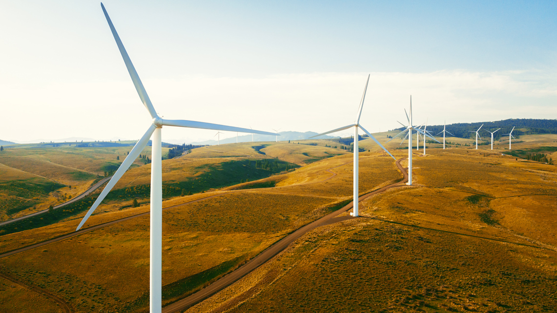 Solar energy with solar panels and wind turbines.