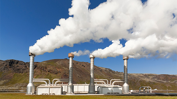 A geothermal power plant emitting smoke.