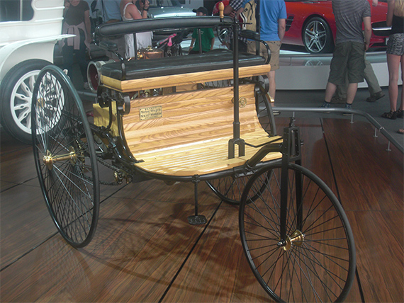 A three-wheeled Benz motor car.