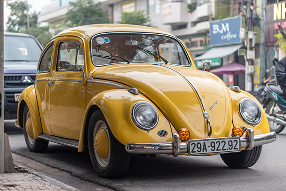 A red Volkswagen Beetle.