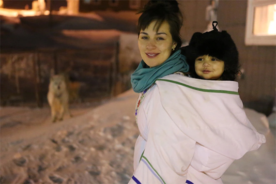 Picture of author Celina Kalluk and her child.
