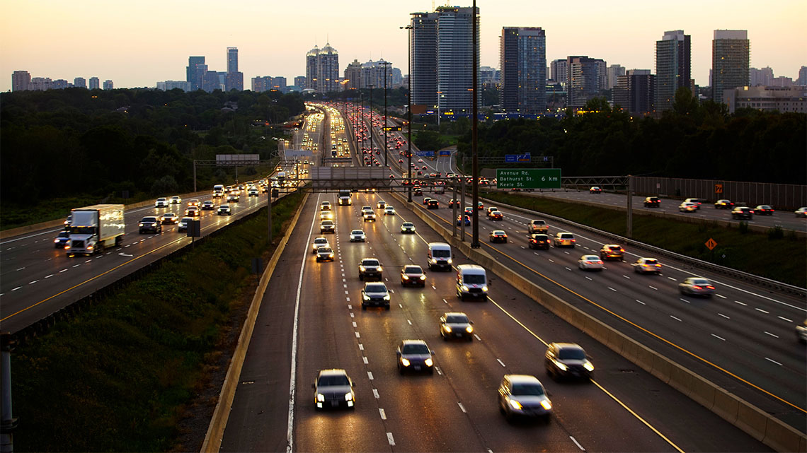 A big highway has lots of lanes for the many cars and trucks that drive on it.