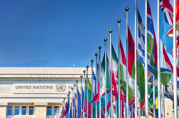United Nations building with nation flags.