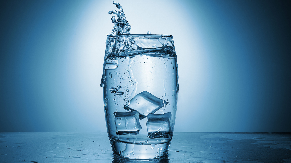 Ice cubes in a glass of water