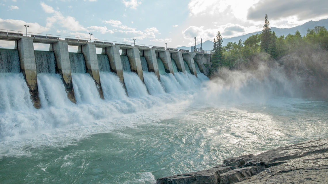 Water rushing through a hydroelectric dam
