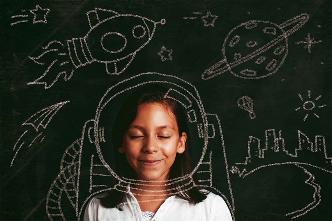 Image of a girl imagining herself as an astronaut.