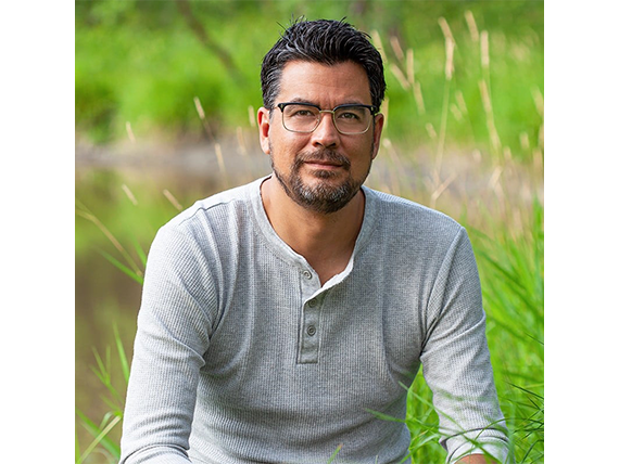 A portrait of author David A. Robertson.