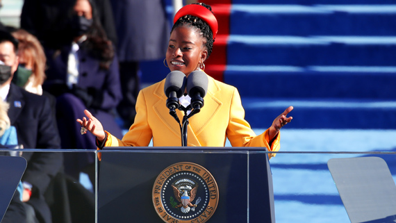 Amanda Gorman speaking at a podium.