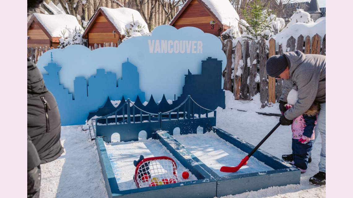 Playing minigolf in the snow at the Quebec winter carnival