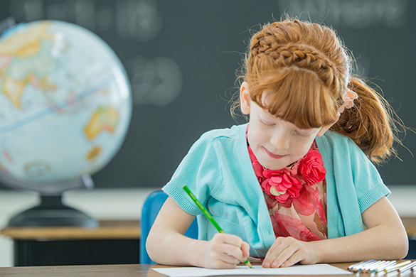 A girl drawing.