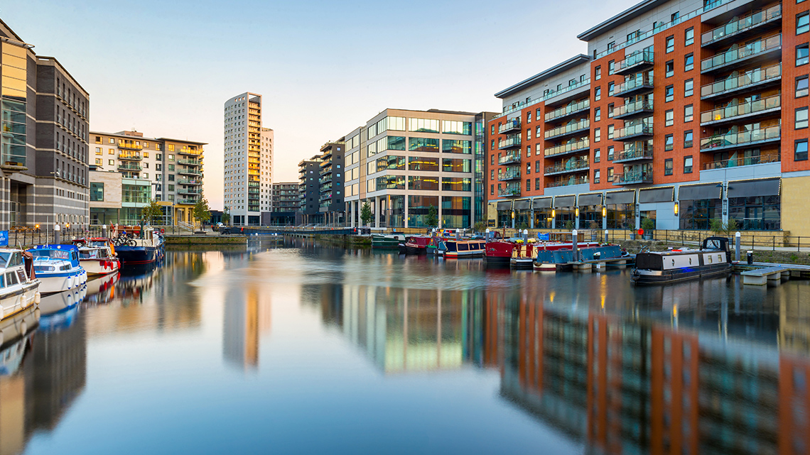A Dock in Leeds, England A dock surrounded by buildings in the town of Leeds, England.