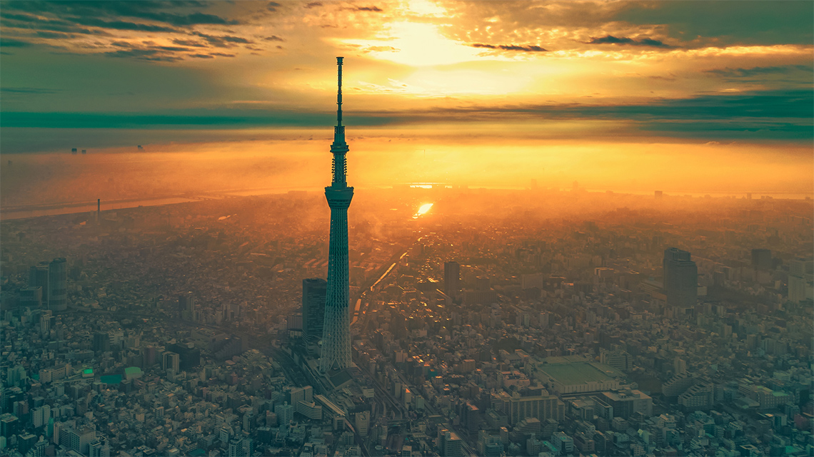 An aerial photo of Tokyo, Japan, at sunrise that reveals the hyper density of the city’s
                                buildings.