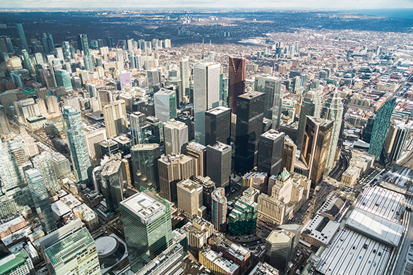 A View of Downtown Skyscrapers in Toronto, Ontario An aerial image of many kinds of skyscrapers crowded together in downtown Toronto