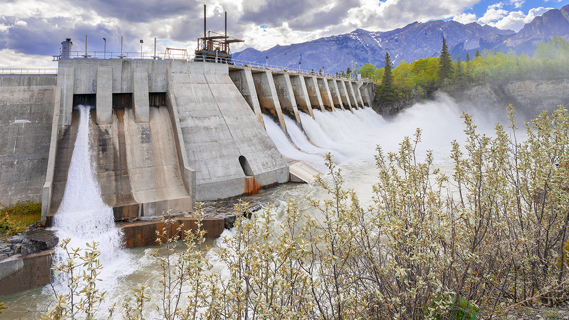 A Dam A hydroelectric dam in Alberta. Water rushes through the gates, spinning the turbine for
power.