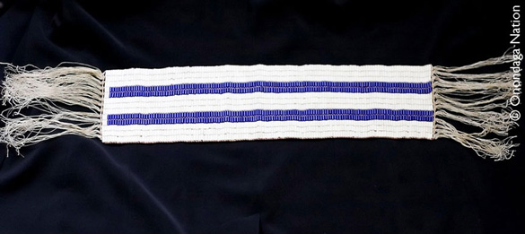 A wampum belt woven from shell beads.