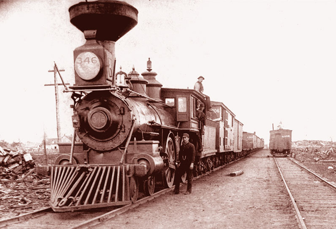Sturgeon Falls, Ontario, 1880s steam locomotive and freight train.